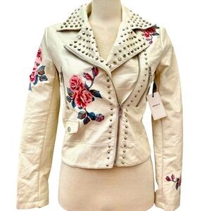 NWT White faux leather jacket with spike and rose printed details size small